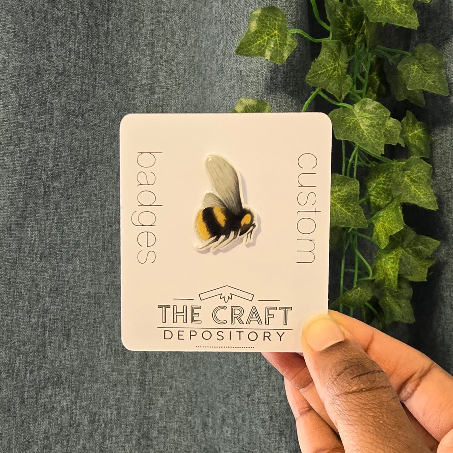 Bumblebee resin badge pin presented on branded backing card