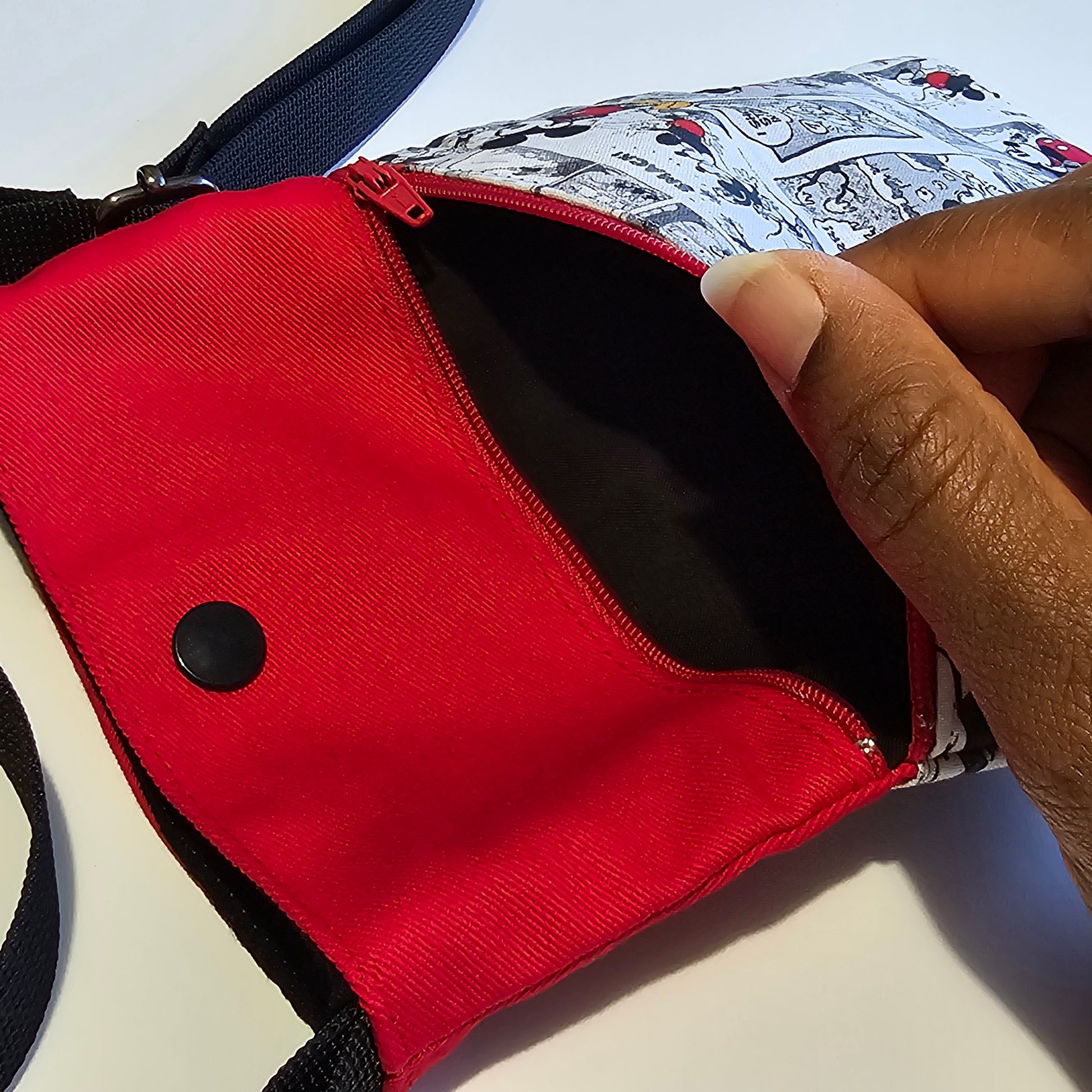 Handmade phone bag showing spacious front zip compartment