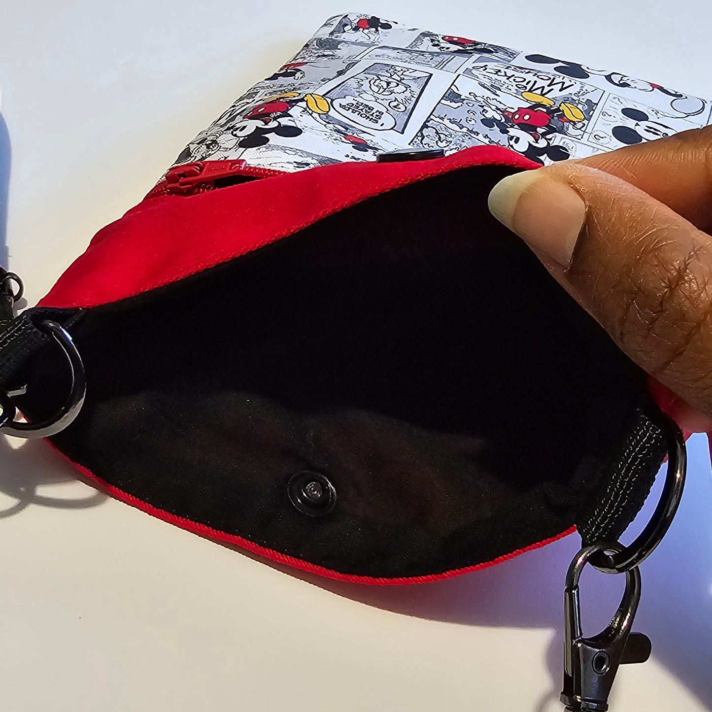 Handmade shoulder bag showing middle main storage compartment for storing essentials