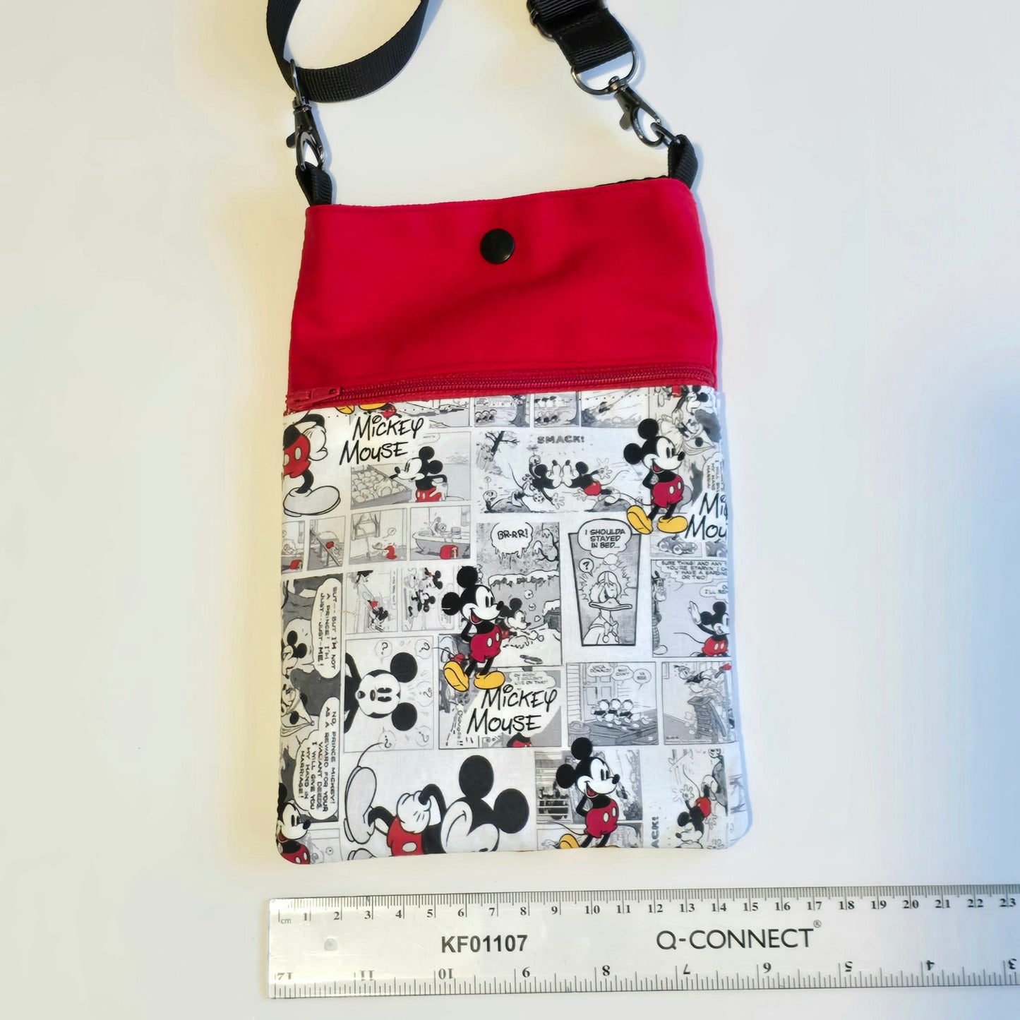 Handmade crossbody phone bag measuring approximately 15 cm by 23 cm