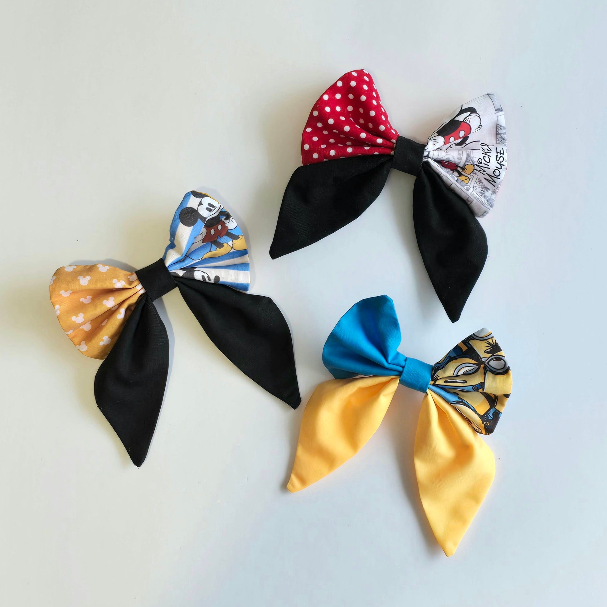 Collection of handmade patchwork hair bows in multiple colour combinations